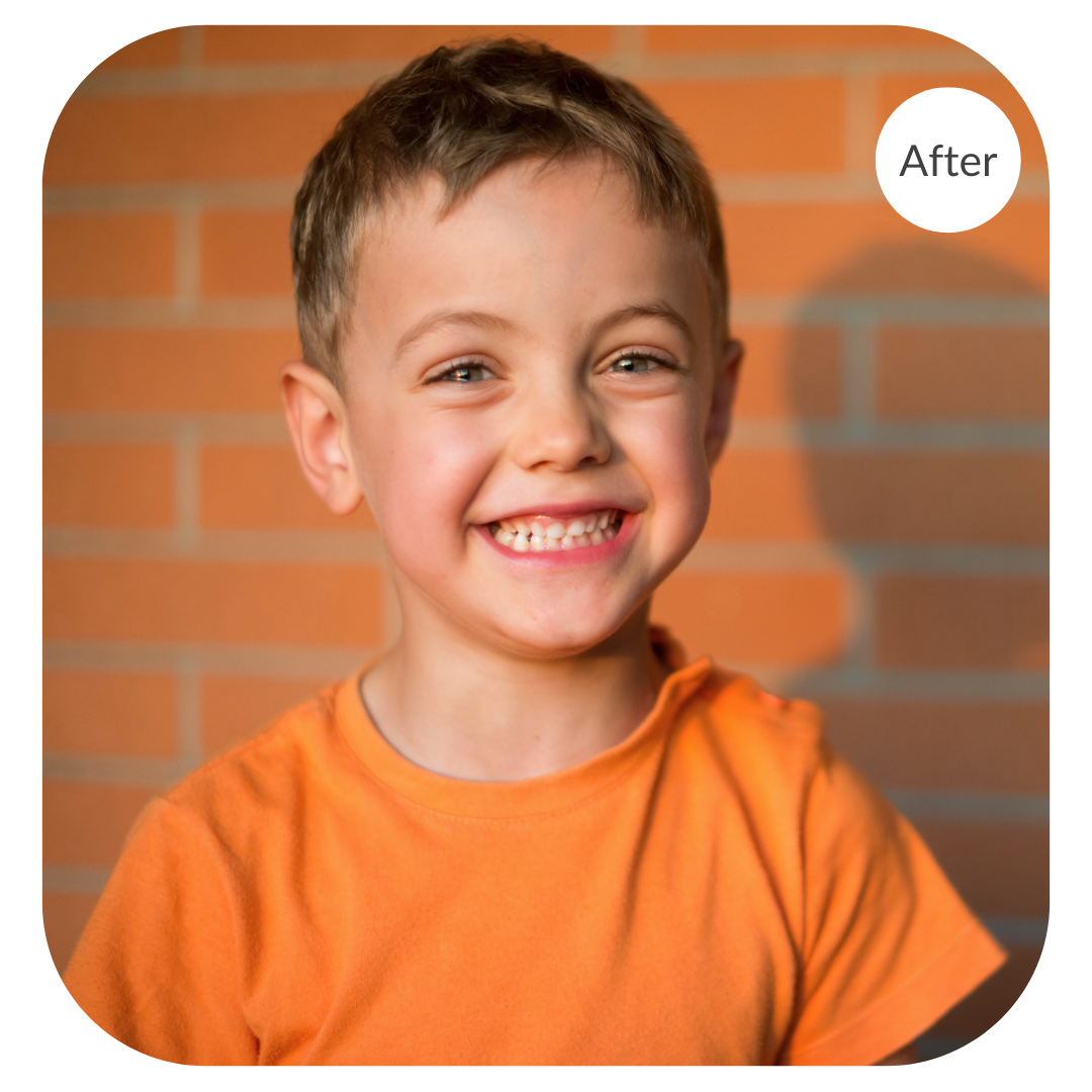 Portrait of a boy in an orange shirt against a brick background after the image has been color corrected by 36Pix